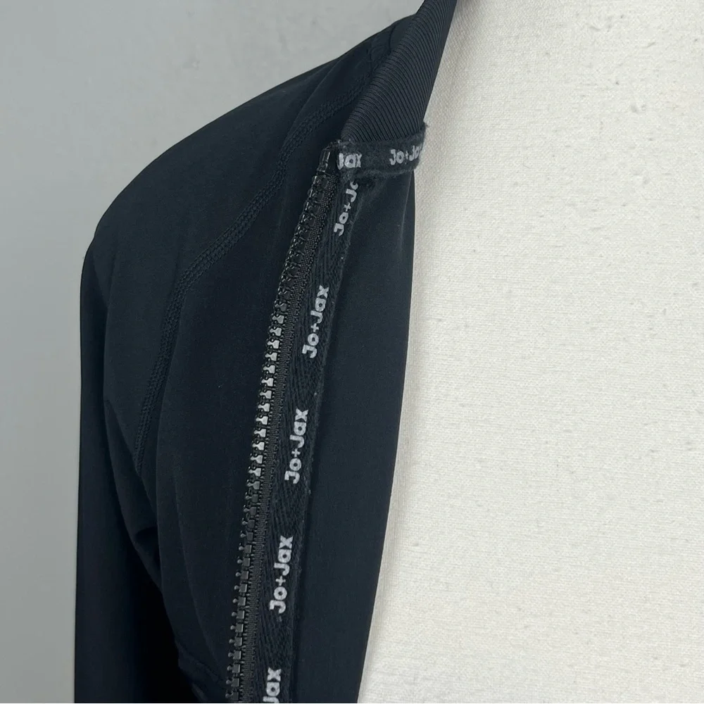 Jo + Jax black Restart full zip back logo jacket, size adult XXS.